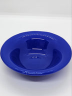 A small trinket glass bowl in cobalt blue.