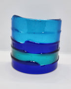 Blue fused glass Landscape Luminary with layered translucent glass designed to display candlelight or brighten a windowsill with soft natural light.