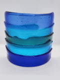 Blue fused glass Landscape Luminary with layered translucent glass designed to display candlelight or brighten a windowsill with soft natural light.