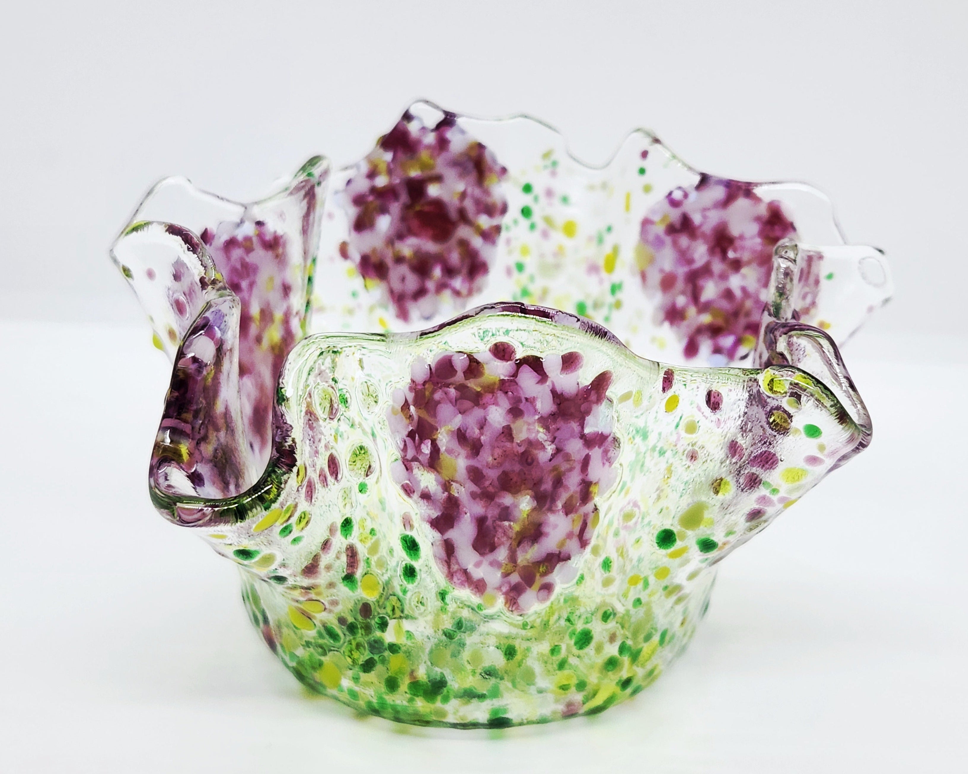 Mini wildflower bowl pink and white flowers covering the free form shape. 