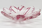 clear glass bowl with pink accents and a pink center on a white background.