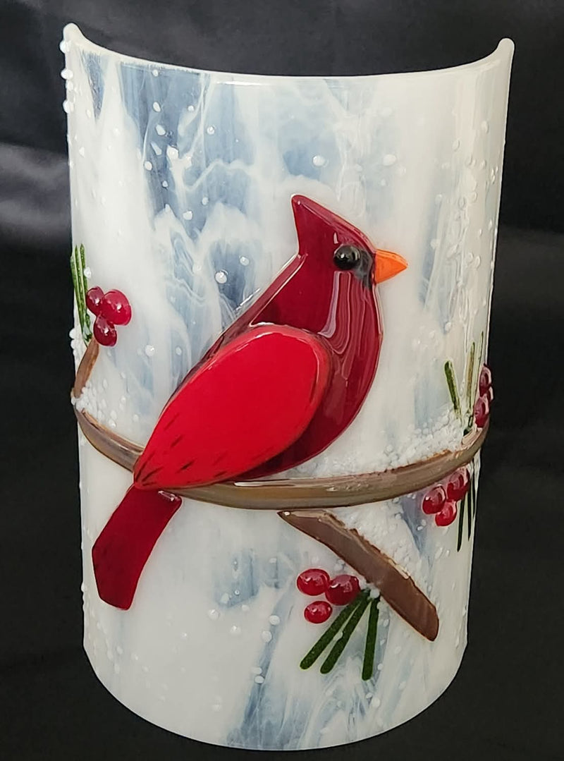 Festive glass cardinal candle screen decor.