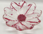 clear glass bowl with pink accents and a pink center on a white background.